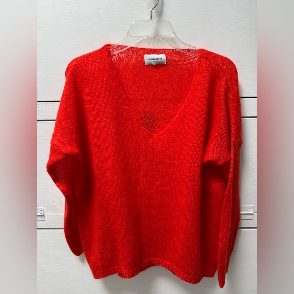 Red wool Nina Kendosa v neck  long sleeve sweater. Made in Italy.